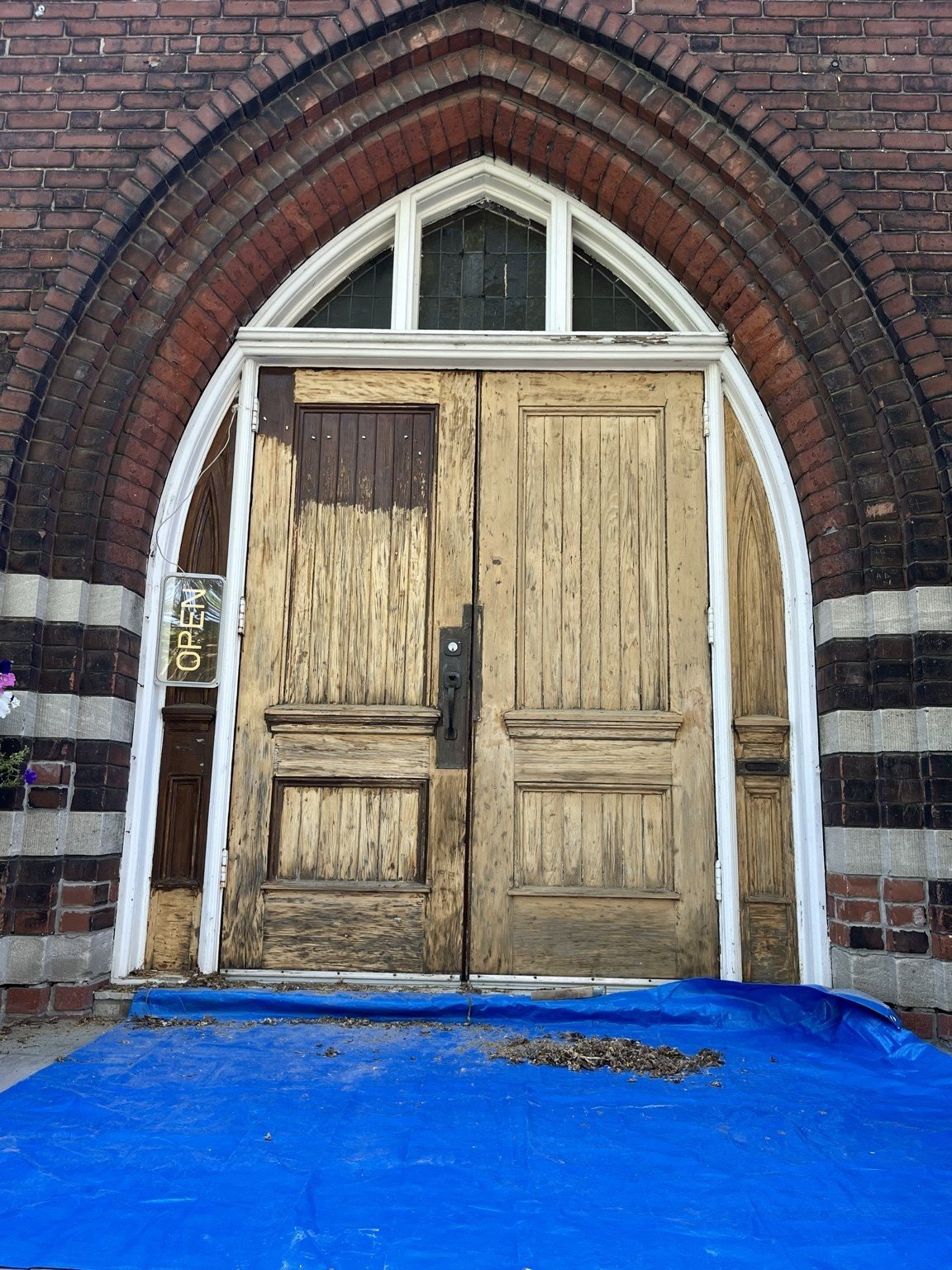 Stripping in progress — wood revealed