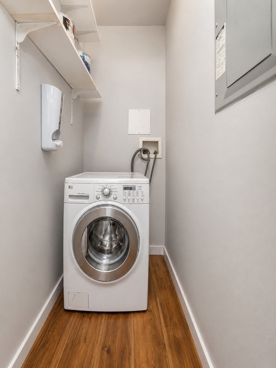 Laundry room before custom shelving